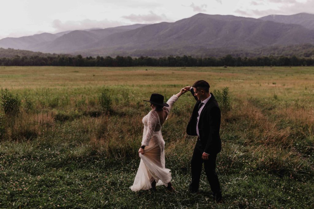 Adventure elopement in the Great Smoky Mountain National Park in Tennessee with tent camping at Elkmont Campground and wedding ceremony in Cades Cove captured by Magnolia + Ember